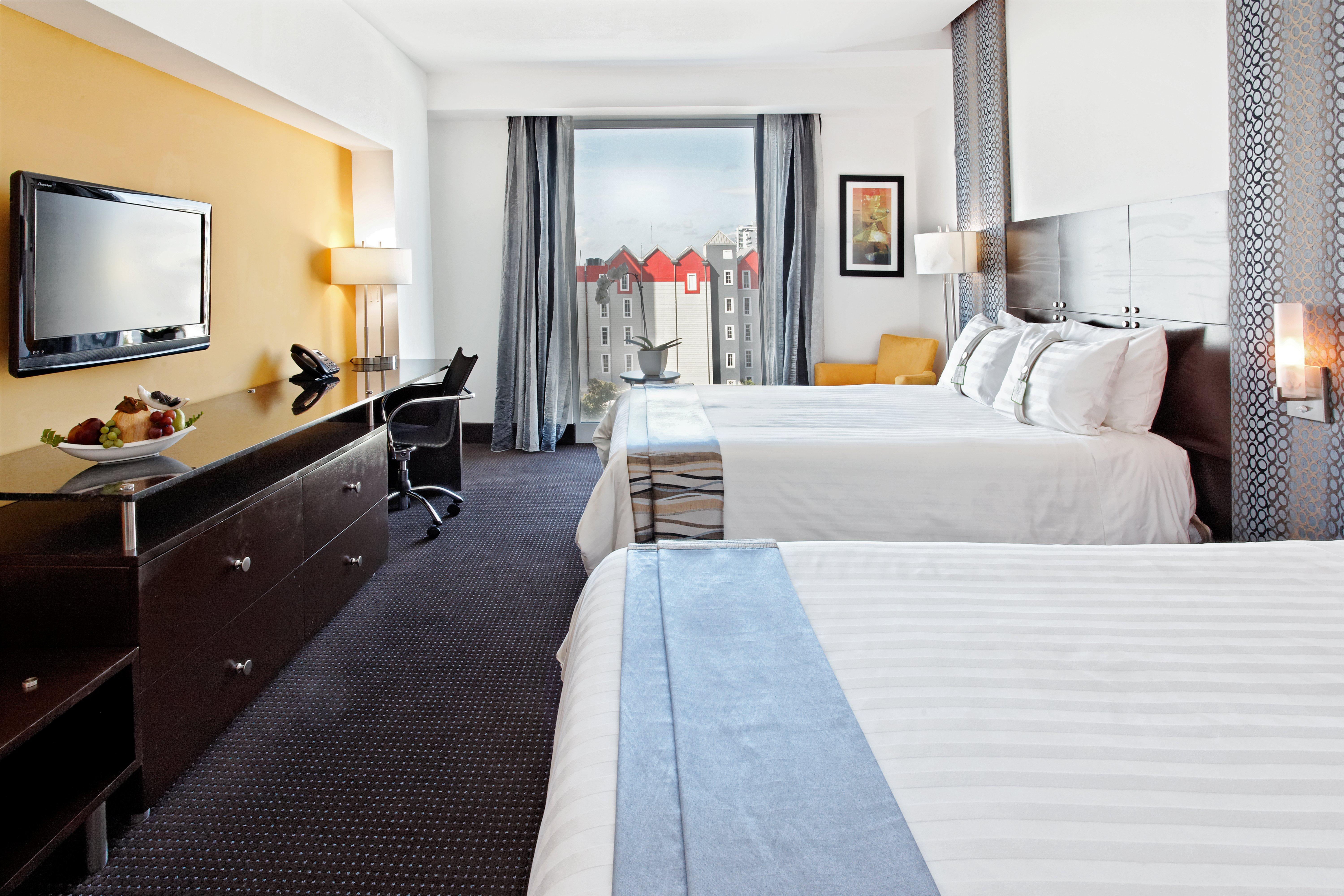 فندق وأجنحة هوليداي إن سانتو دومينجو المظهر الخارجي الصورة A typical room at the hotel