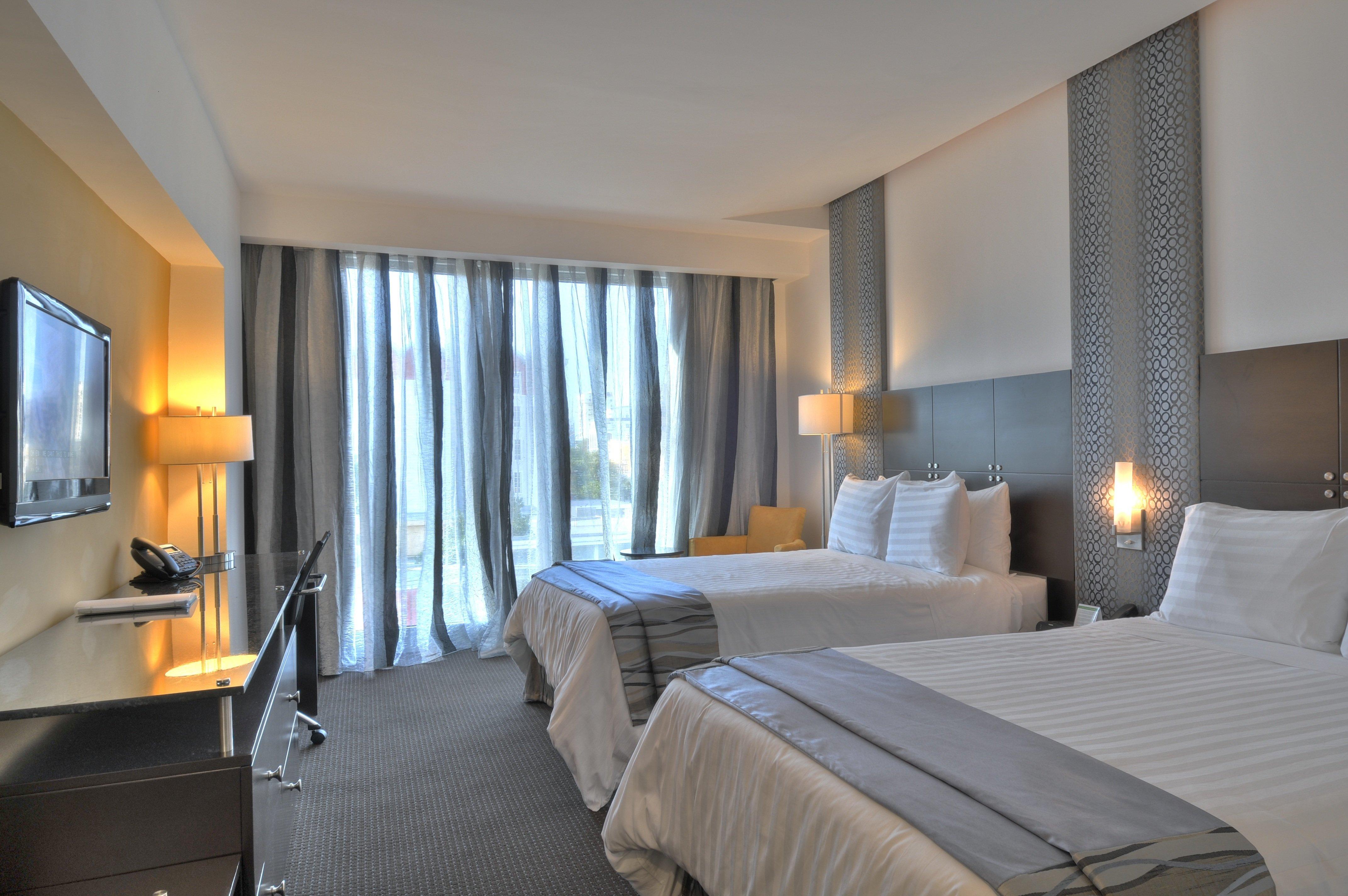 فندق وأجنحة هوليداي إن سانتو دومينجو المظهر الخارجي الصورة A room at the hotel