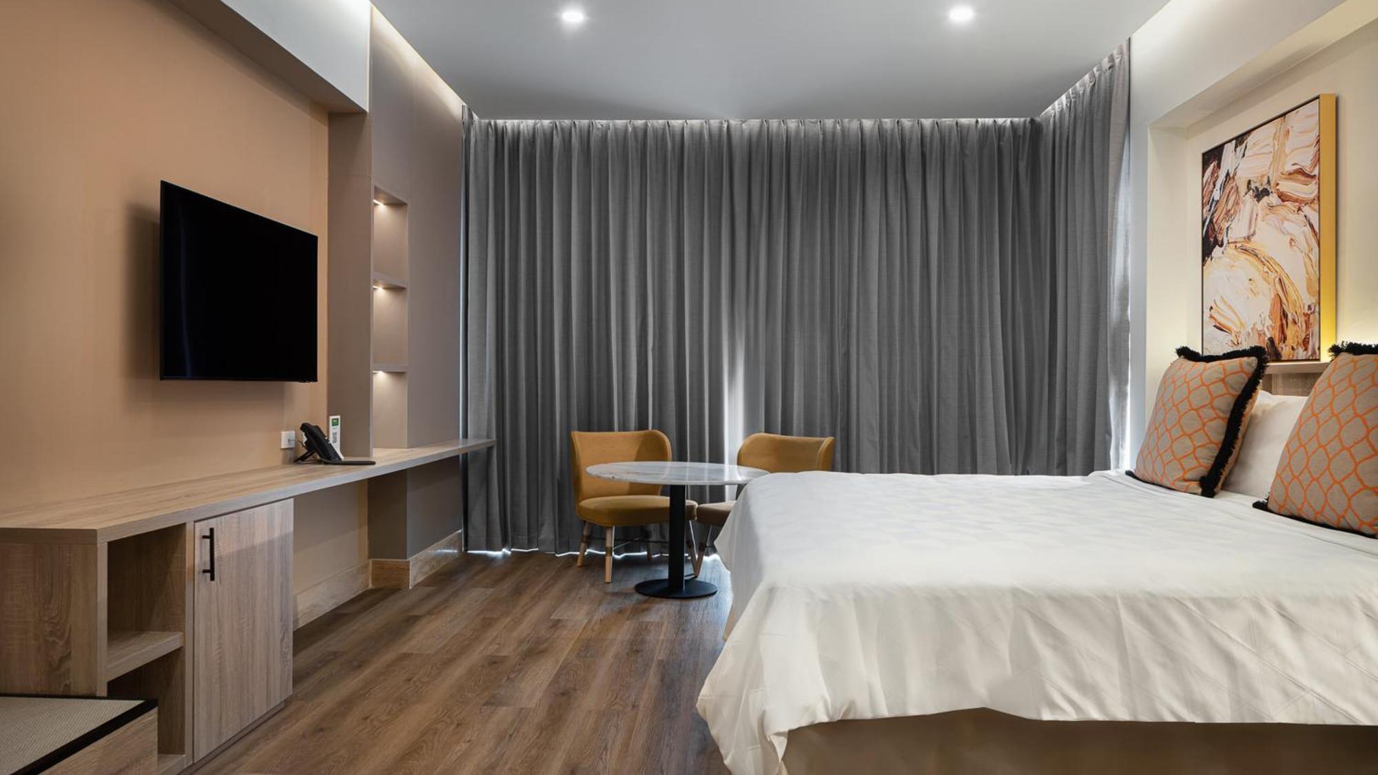 فندق وأجنحة هوليداي إن سانتو دومينجو المظهر الخارجي الصورة A room at the hotel